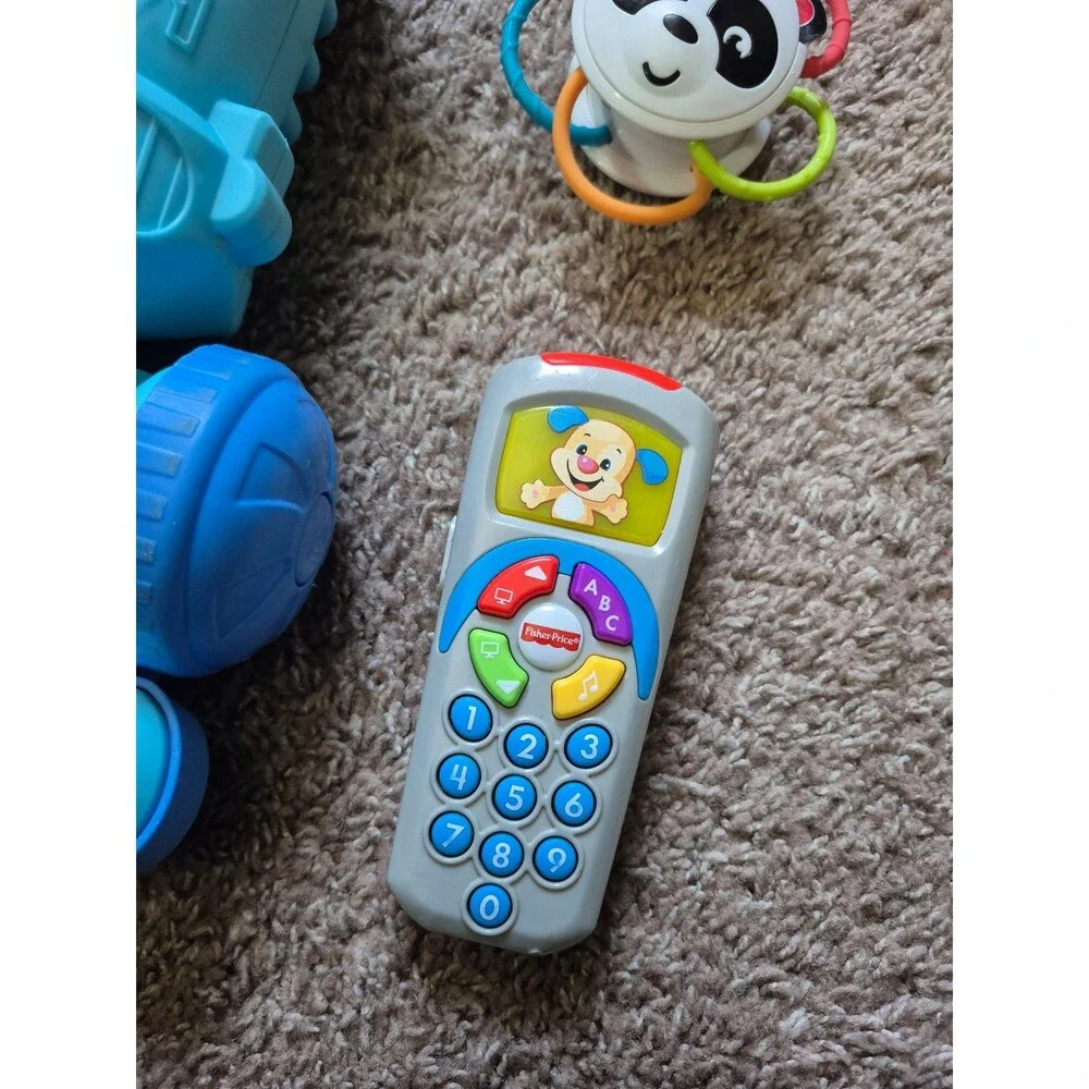 Fisher price vacumm phone and sensory toy lot